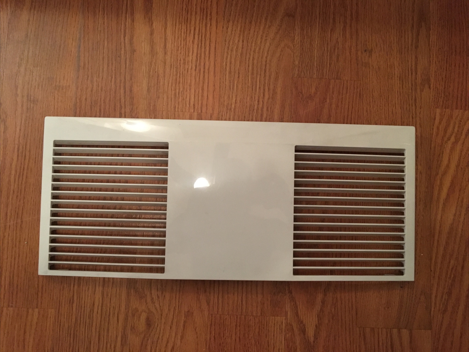 Kenmore ac model: 253.77120 Front panel air grille 18.85x 7.91x 0.70 in